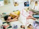 A woman laying on the floor next to a pile of books.